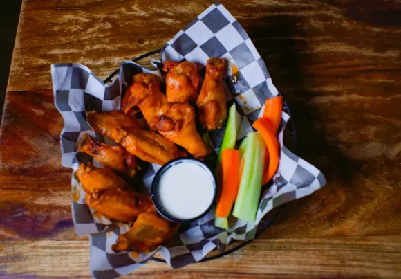 A picture of a plate of wings.