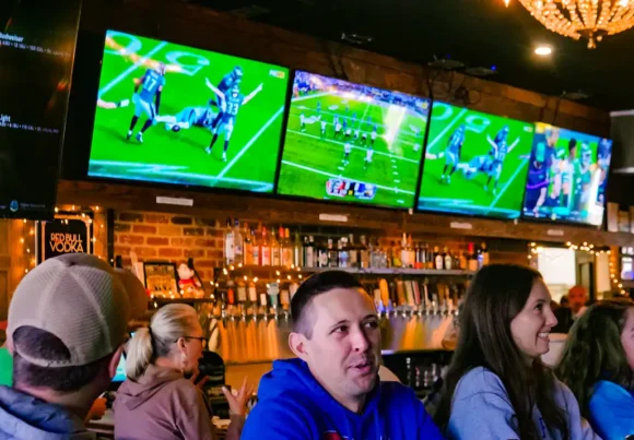 inside of bar with tvs